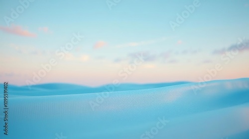 Light blue sky with a few Softly glowing blue fabric with a textured weave reminiscent of a gentle ocean breeze, soothing colors, calming atmosphere, serene landscape