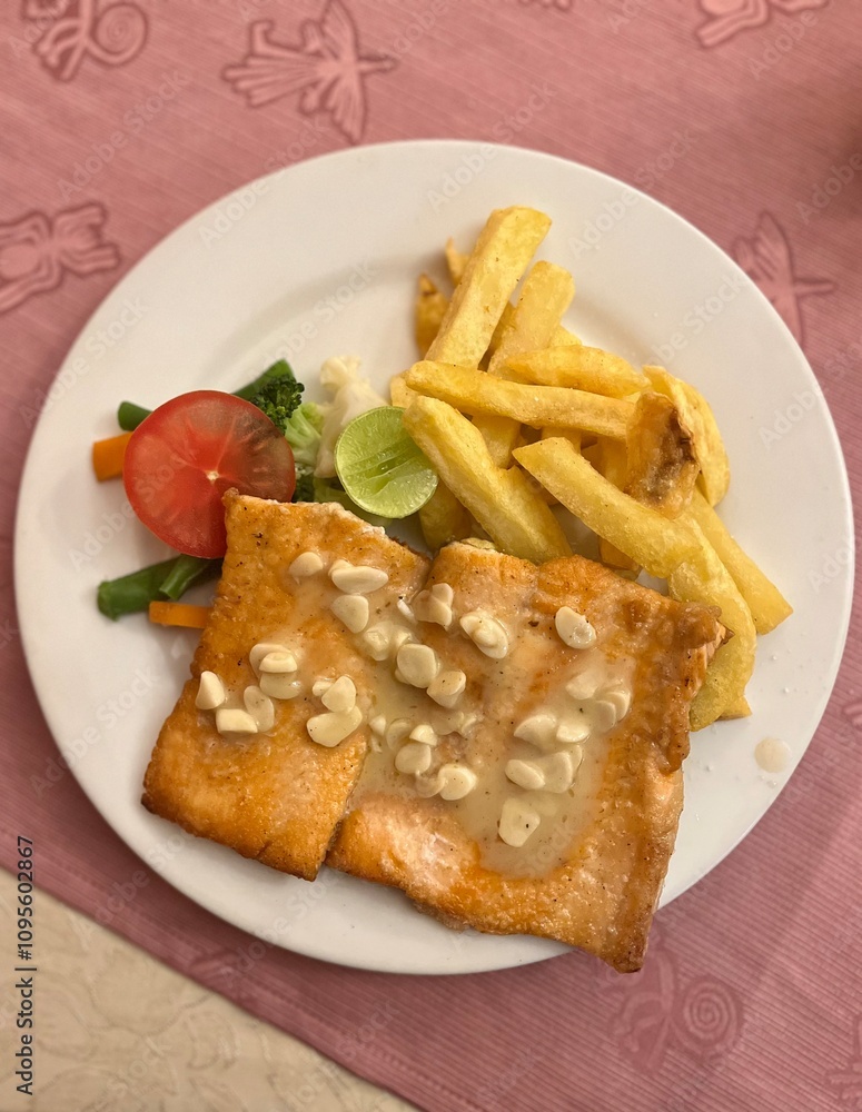 Trout fish with garlic and fries Trout fish with garlic and fries