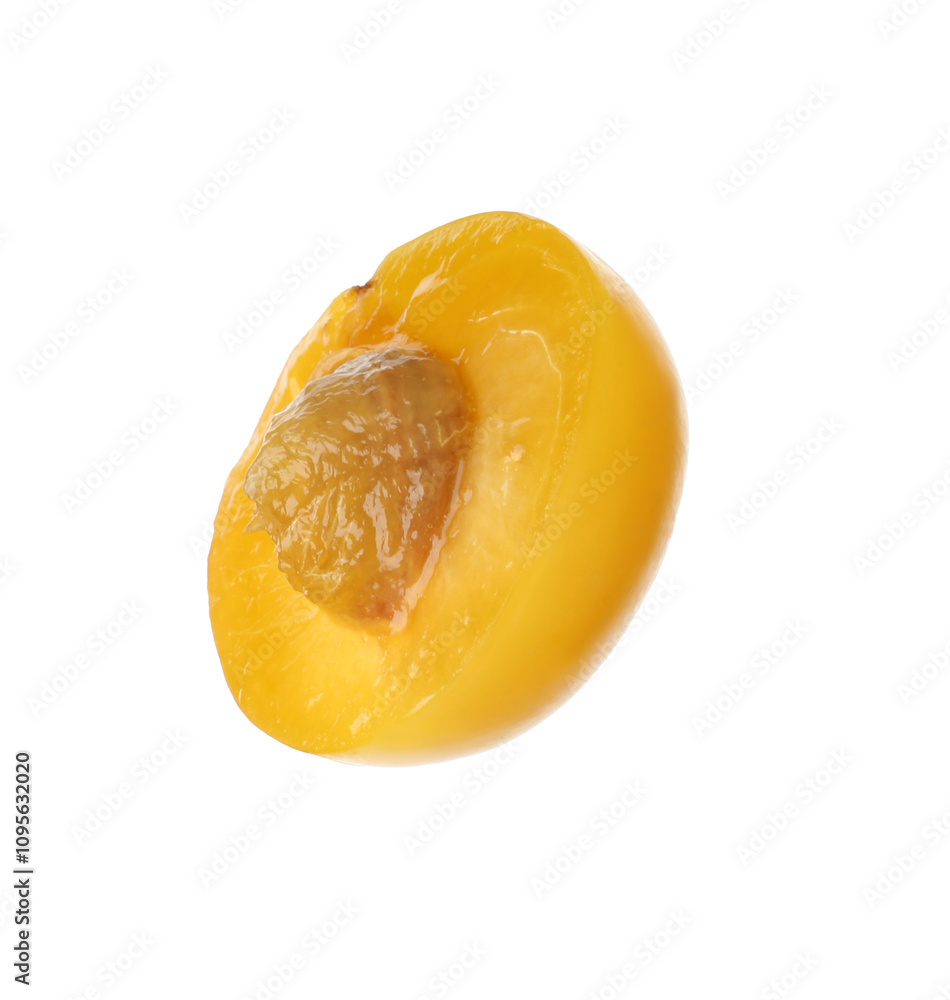 Half of ripe plum isolated on white Half of ripe plum isolated on white