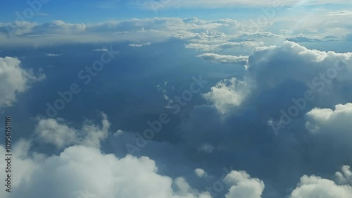 Wallpaper Mural Aerial-Skimming over the tops fluffy sun lit cumulus clouds Torontodigital.ca