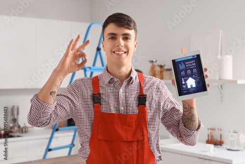 Male worker showing tablet ...
