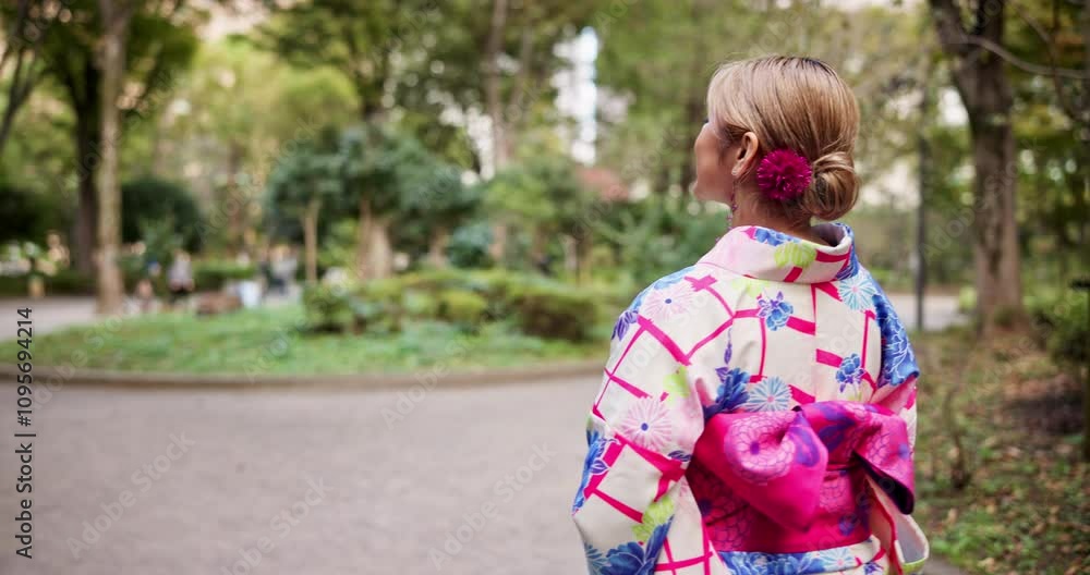 Japanese, back and girl with kimono in park for culture travel, indigenous clothes and nature sightseeing. Woman, walking and fashion with spiritual vacation, traditional morning and history in Japan Japanese, back and girl with kimono in park for culture travel, indigenous clothes and nature sightseeing. Woman, walking and fashion with spiritual vacation, traditional morning and history in Japan