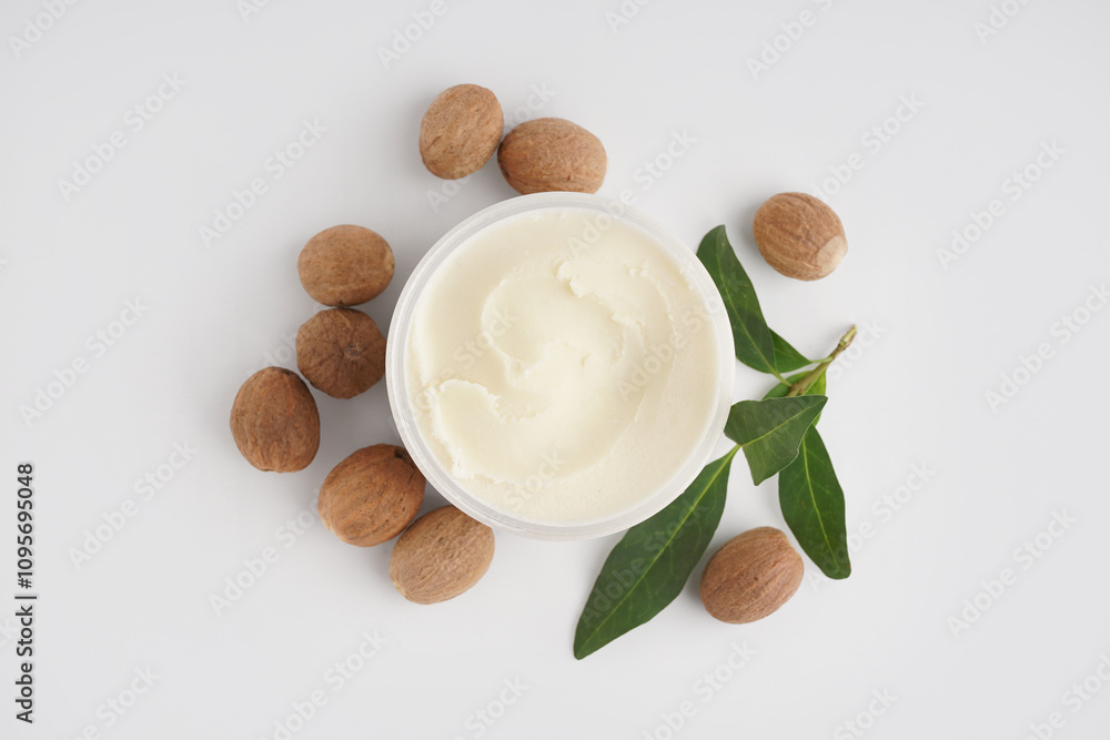 Jar with shea butter on white background Jar with shea butter on white background