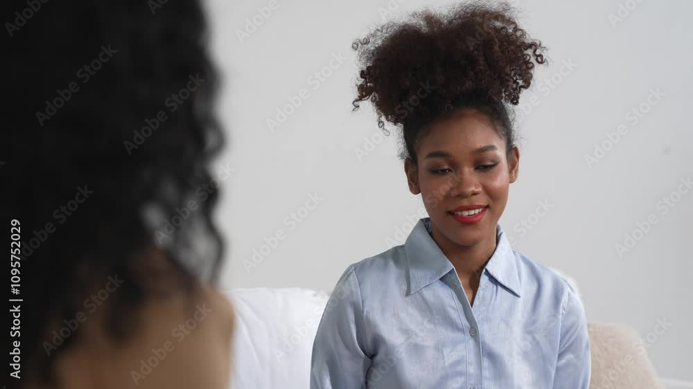 Happy patient and psychologist exchanging mental health conversation in clinic with positive emotion while explaining crucial successful work and life to psychologist in home office Happy patient and psychologist exchanging mental health conversation in clinic with positive emotion while explaining crucial successful work and life to psychologist in home office