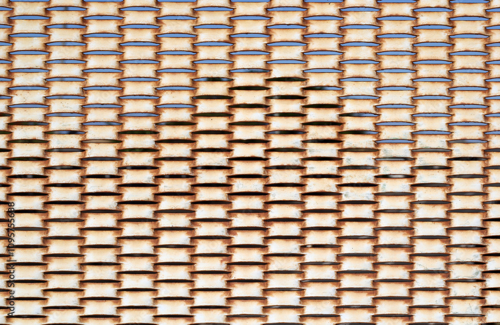 Weathered rusty expanded metal mesh abstract texture background Weathered rusty expanded metal mesh abstract texture background