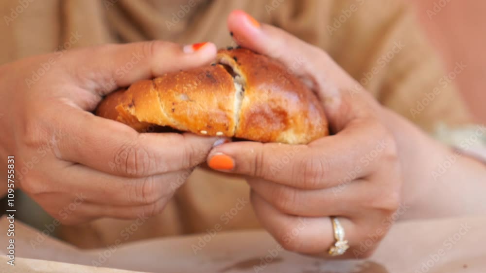 Two Hands Gently Holding a Freshly Baked and Golden Brown Pastry Ready to Be Enjoyed Two Hands Gently Holding a Freshly Baked and Golden Brown Pastry Ready to Be Enjoyed