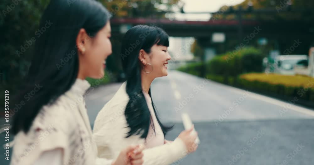 Running, funny and women in street, travel and bonding together with happiness. Japanese people, outdoor and girls in road, excited and cheerful with vacation, adventure and friends with journey Running, funny and women in street, travel and bonding together with happiness. Japanese people, outdoor and girls in road, excited and cheerful with vacation, adventure and friends with journey