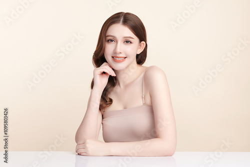 Beautiful young asian woman with clean fresh skin on beige background, Face care, Facial treatment, Cosmetology, beauty and spa, Asian women portrait.