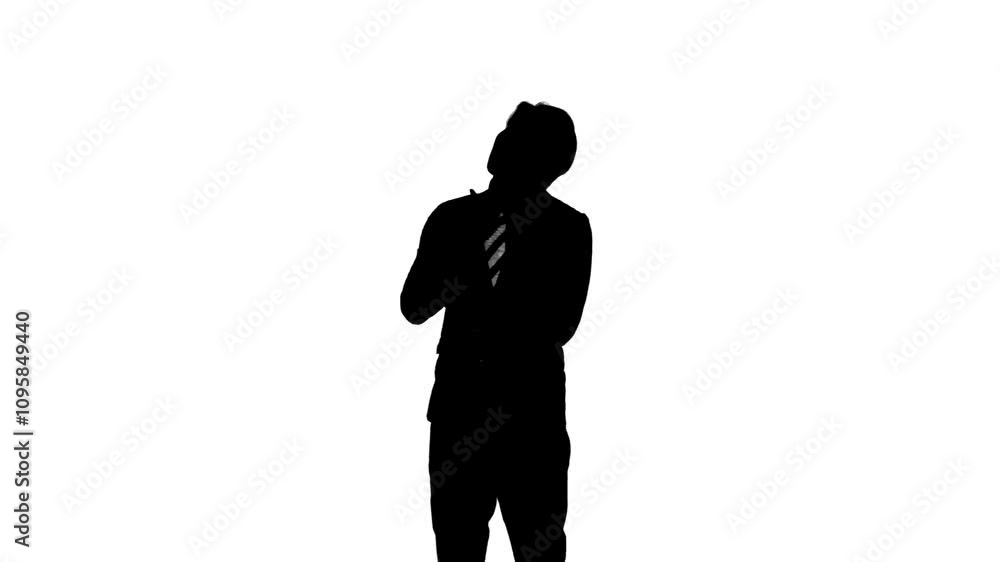 悩ましく考える男性ビジネスパーソンのシルエット 悩ましく考える男性ビジネスパーソンのシルエット