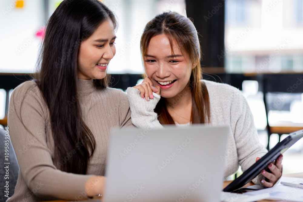 Two asian confident business people point to graphs and charts to analyze market data, balance sheet, account, net profit to plan new sales strategies to increase production capacity.
Two asian confident business people point to graphs and charts to analyze market data, balance sheet, account, net profit to plan new sales strategies to increase production capacity.