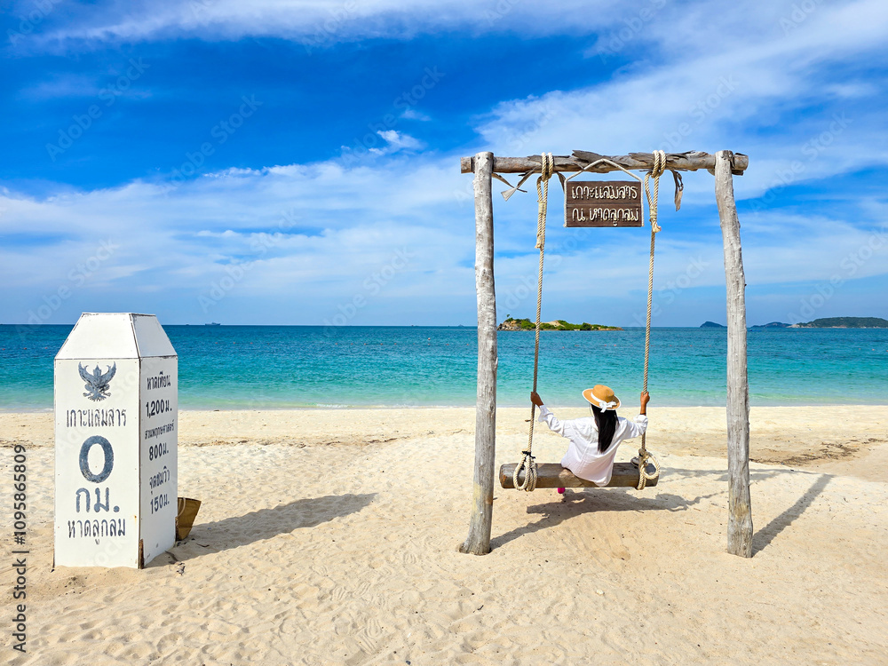 Swinging into tranquility on Samae San Island in Thailand's serene paradise Swinging into tranquility on Samae San Island in Thailand's serene paradise