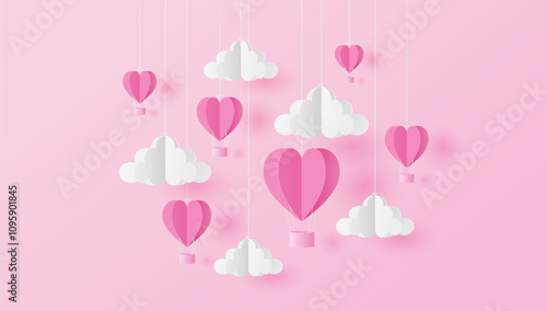 Paper cut of heart shape balloons and clouds on pink background. Valentine's Day concept 
