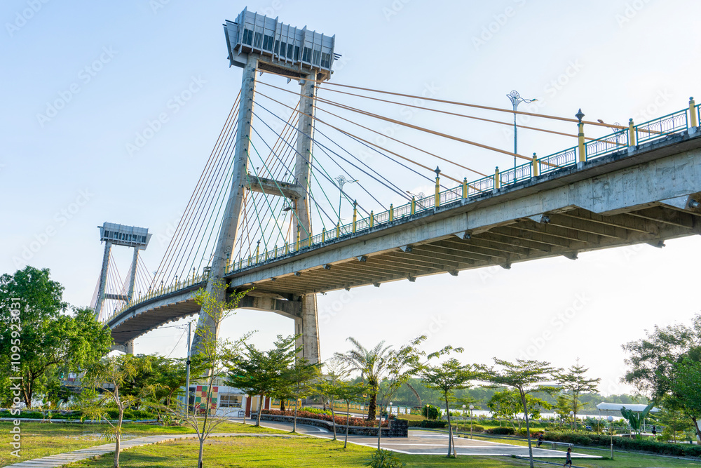 The Tengku Agung Sultanah Latifah Bridge, also known as the Siak Bridge, is a bridge located in Siak Sri Indrapura City, Siak Regency, Riau Province, Indonesia The Tengku Agung Sultanah Latifah Bridge, also known as the Siak Bridge, is a bridge located in Siak Sri Indrapura City, Siak Regency, Riau Province, Indonesia