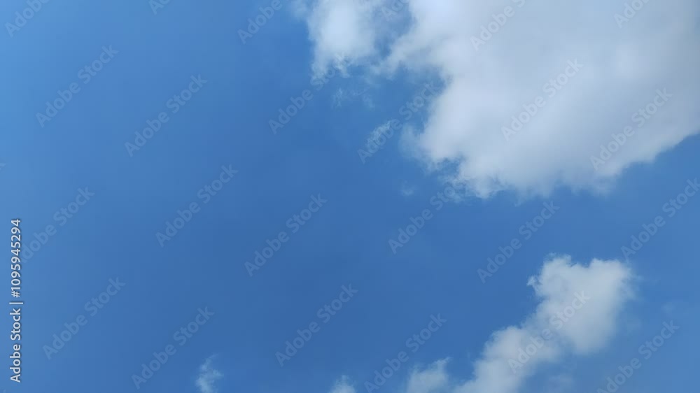 timelapse of clouds with clear sky at noon in summer. texture effect timelapse of clouds with clear sky at noon in summer. texture effect