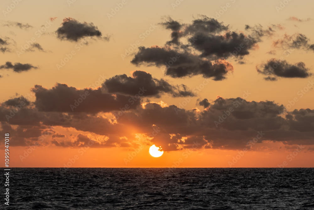Naklejka premium Sunset over the sea