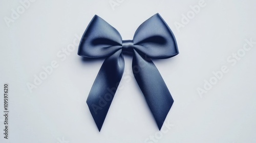 Dark bule ribbon bow isolated on white