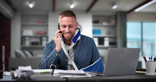 Injured Man Talking On Phone photo