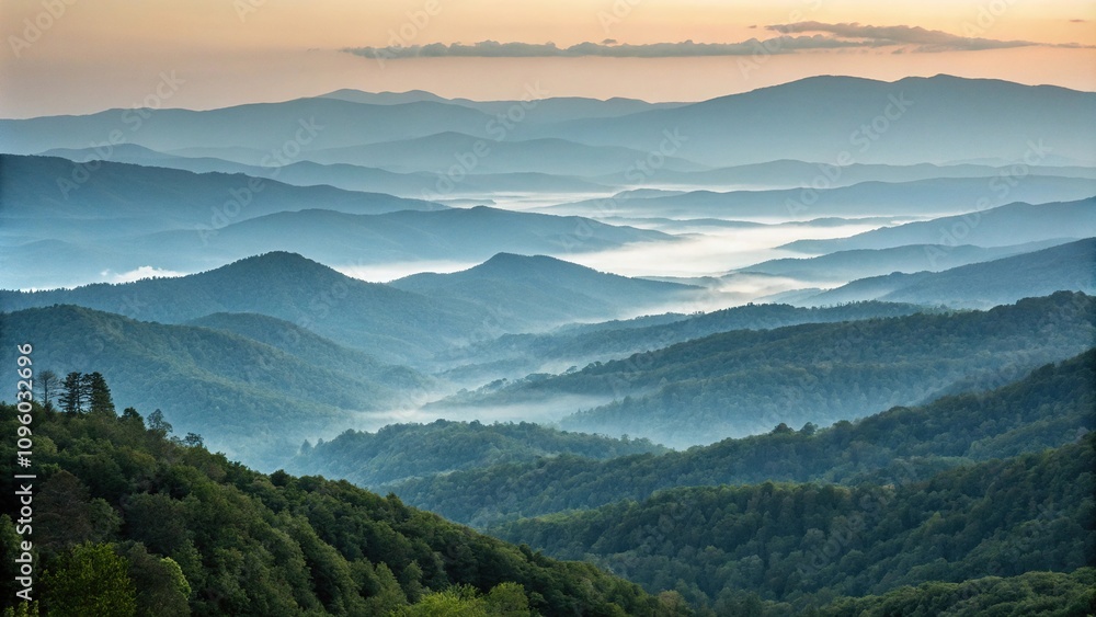 Muted green and blue tones of a foggy mountain range at dawn, atmospheric conditions, misty mountains Muted green and blue tones of a foggy mountain range at dawn, atmospheric conditions, misty mountains