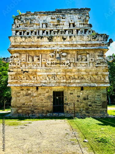 View of the Church or Iglesias,misnomer for a mayan temple with Chac figure heads in the Maya chicen style in the Nunnery complex at  Chichen Itza,masterpiece of the Maya civilization,Yucatan,Mexico