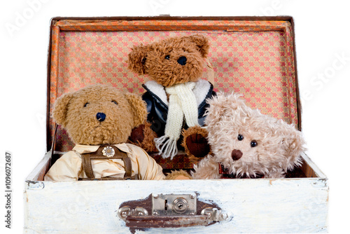 Old toy teddy bears in wooden case photo