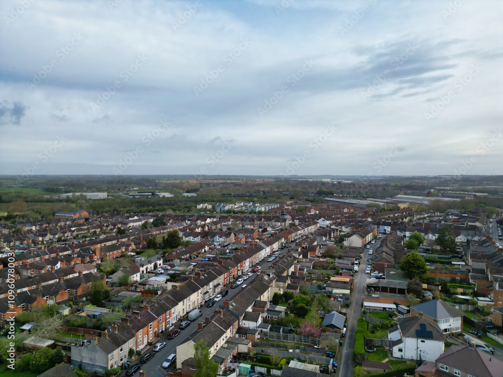 Obraz premium Aerial View of Downtown and Central Rugby City of England Great Britain. Aerial View Was Captured with Drone's Camera During Mostly Cloudy and Rainy Day on April 8th, 2024 from Medium High Altitude.