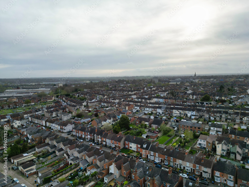 Fototapeta premium Aerial View of Downtown and Central Rugby City of England Great Britain. Aerial View Was Captured with Drone's Camera During Mostly Cloudy and Rainy Day on April 8th, 2024 from Medium High Altitude.
