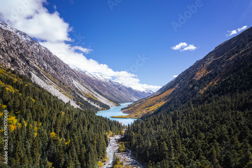 the view of southeast Tibet in autumn with snow mountain and lake