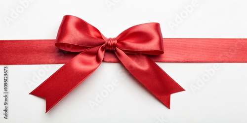 red bow with ribbon on a white background