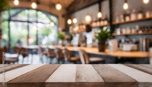 Elegant blurred coffee shop and restaurant interior with warm ambient lighting and empty wooden table, ideal for product display mockups, promotional designs, or branding projects.