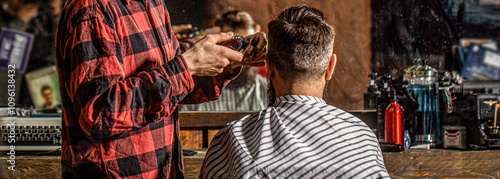 Men visiting hairstylist in barbershop. Hipster client getting haircut. Hands of barber with hair clipper. Hipster client getting haircut photo