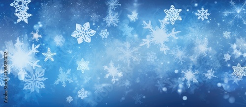 Blue Christmas background with white snowflakes creating a festive winter atmosphere from a top-down perspective photo