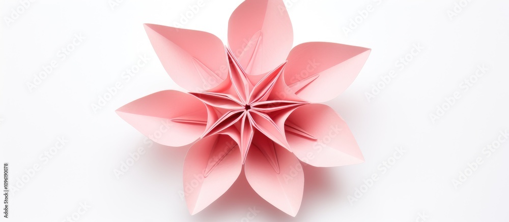 Pink origami flower artfully designed against a clean white background showcasing intricate folding techniques and artistic creativity Pink origami flower artfully designed against a clean white background showcasing intricate folding techniques and artistic creativity