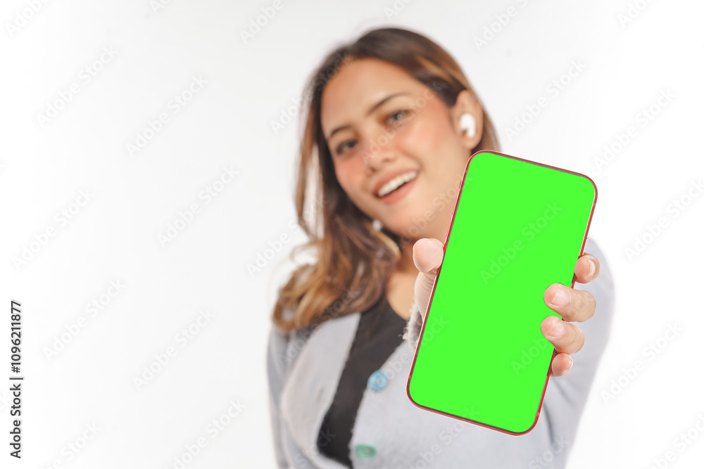 young asian Woman while using airpods shows blank smartphone screen young asian Woman while using airpods shows blank smartphone screen