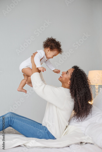 Love of a mother and baby. Family at home. Lifestyle