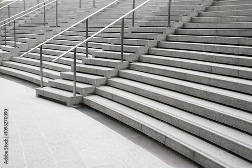 Stairs. subway staircase old in interior secluded, concrete stairs in the city, stone granite stair steps often seen on metro station and landmarks, going up. Architectural interiors underground. photo