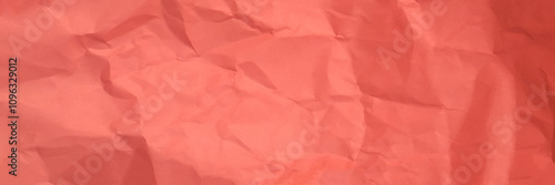 Crumpled pink paper background texture