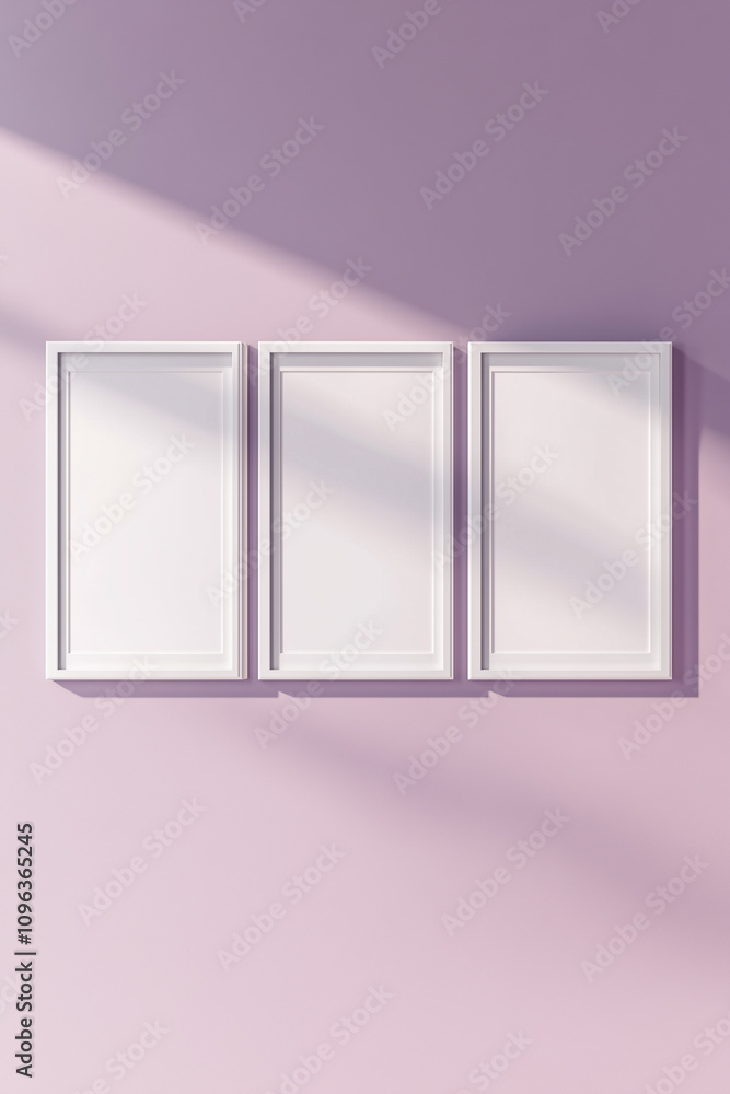 Set of three white frames on pastel pink wall Set of three white frames on pastel pink wall