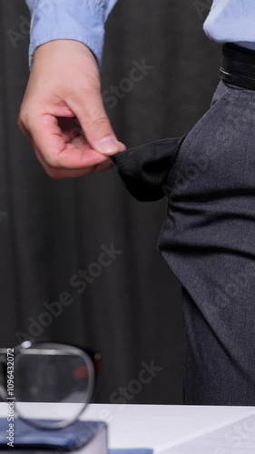 vertical video Businessman showing empty pockets after bankruptcy filing