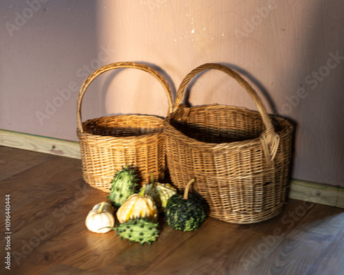 beautiful wicker baskets, various garden produce, pumpkins, home products, interior items, autumn harvest photo