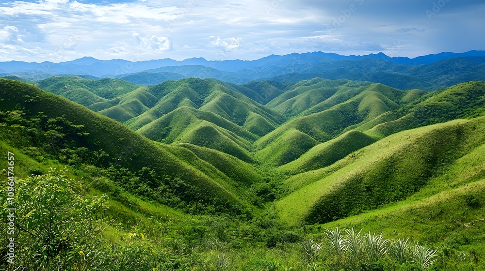Breathtaking view of lush green rolling hills under a dramatic sky. Breathtaking view of lush green rolling hills under a dramatic sky.