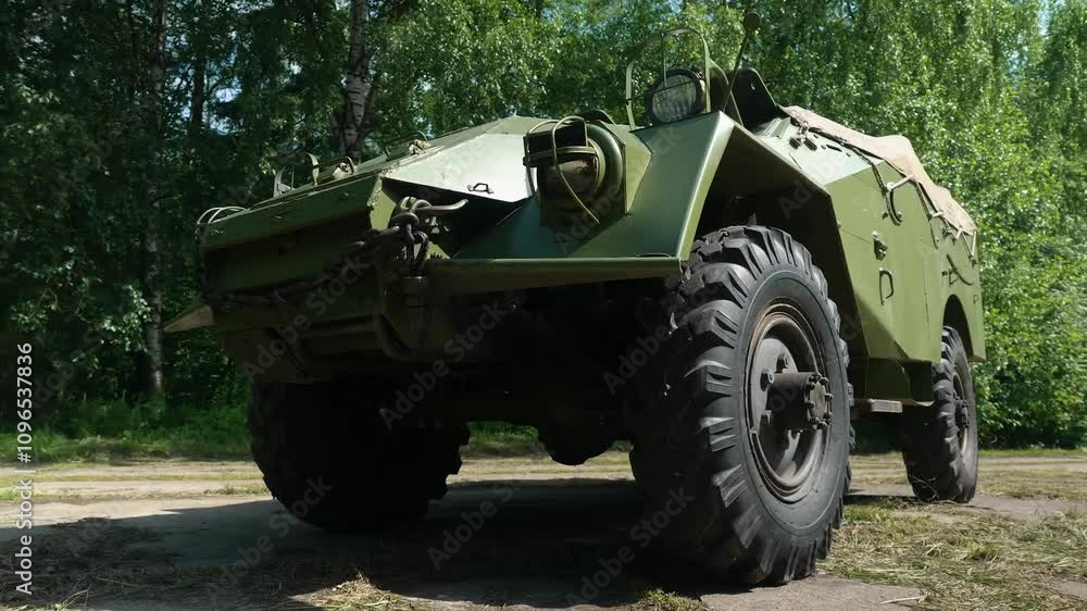 The vehicle, used for transporting soldiers, reconnaissance, staff duties, or as an artillery tractor, features a visible welded structure, highlighting its robust design.