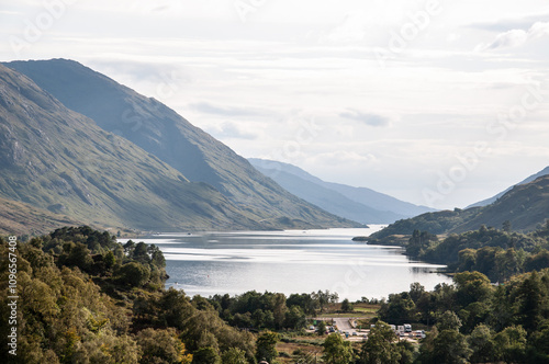 Clear day in scottish highland near the lake photo