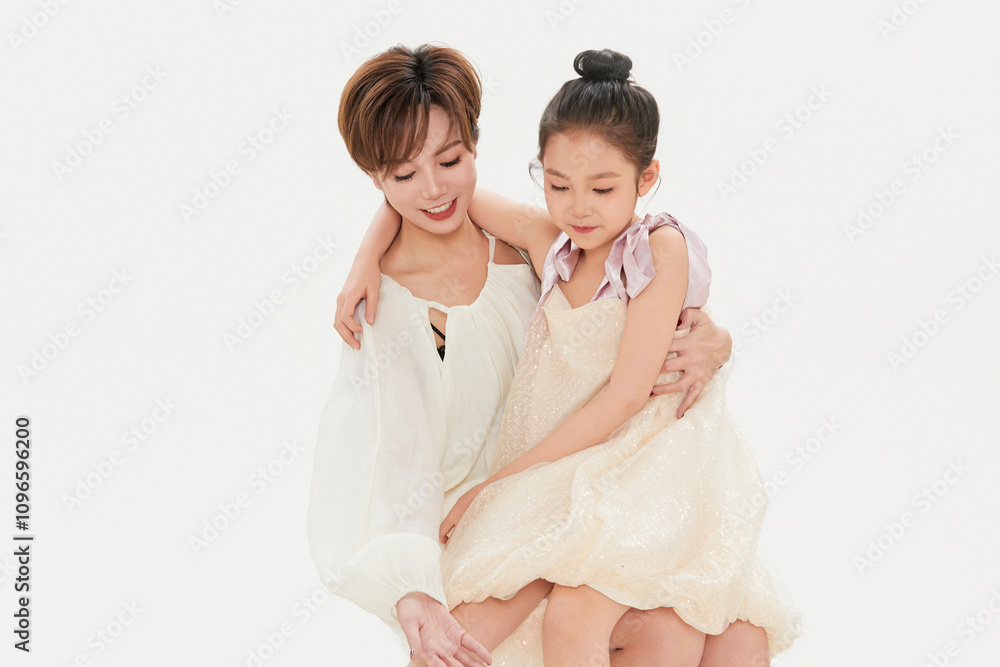 Beautiful mother and cute daughter portrait on white background Beautiful mother and cute daughter portrait on white background