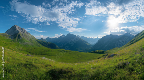 Wallpaper Mural Beautiful green meadow with mountains in the background, a sunny day panorama. Panoramic landscape of the Alps mountain range in the summertime
 Torontodigital.ca