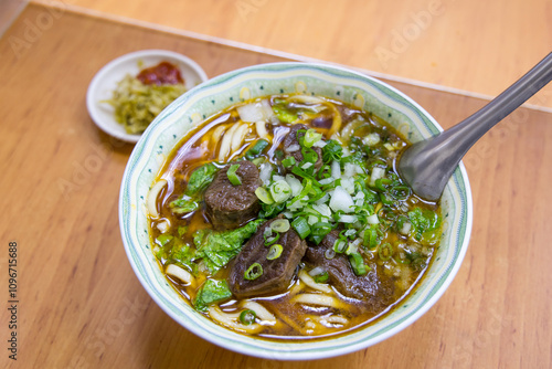 Delicious bowl of Taiwan beef noodle soup served hot