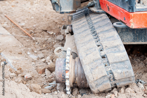 Excavator lost broken track and waiting for repair