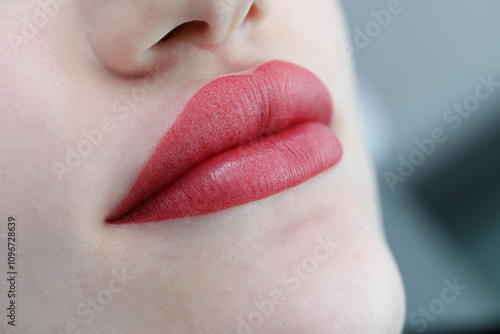 Permanent Make-up on her Lips. Permanent lip makeup completes the lip makeup procedure with a close-up
