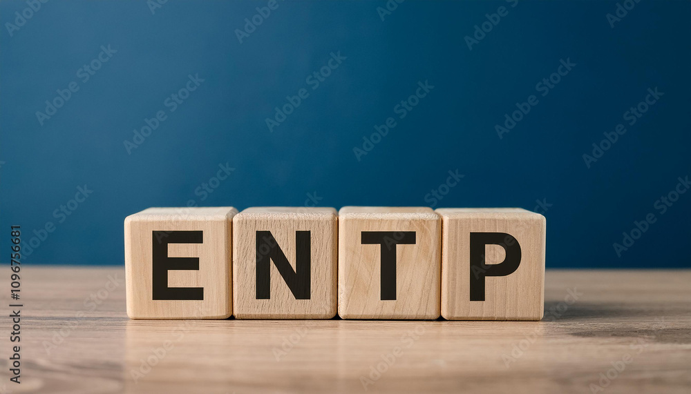 Wooden cubes with abbreviation ENTP on table. Extraverted, Ntuitive, Thinking, Perceiving. Wooden cubes with abbreviation ENTP on table. Extraverted, Ntuitive, Thinking, Perceiving.