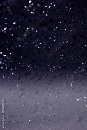 Close Up of Rain Drop Bubble Water on Glass Metal Background with Condensation