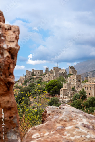 Ancient stone village of Vatheia under a cloudy sky in Greece, Mani, Peloponnese photo